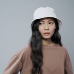 9 Casual Bucket Hat Outfits That Are Totally Wearable